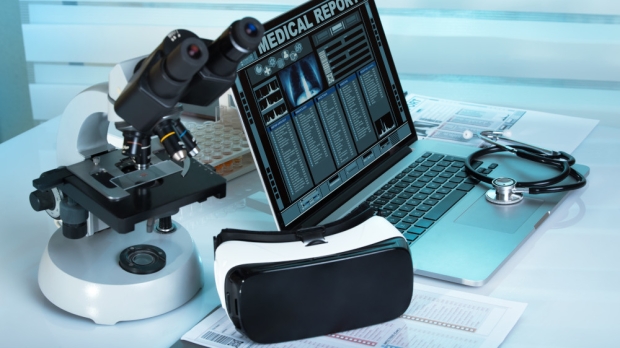 Virtual reality equipment in the laboratory / Laptop with remote diagnostic medical equipment
